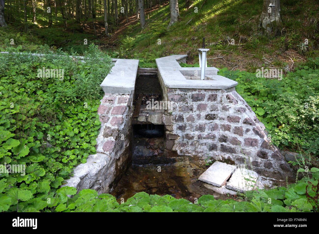 Mountain water catchment alpine type Stock Photo