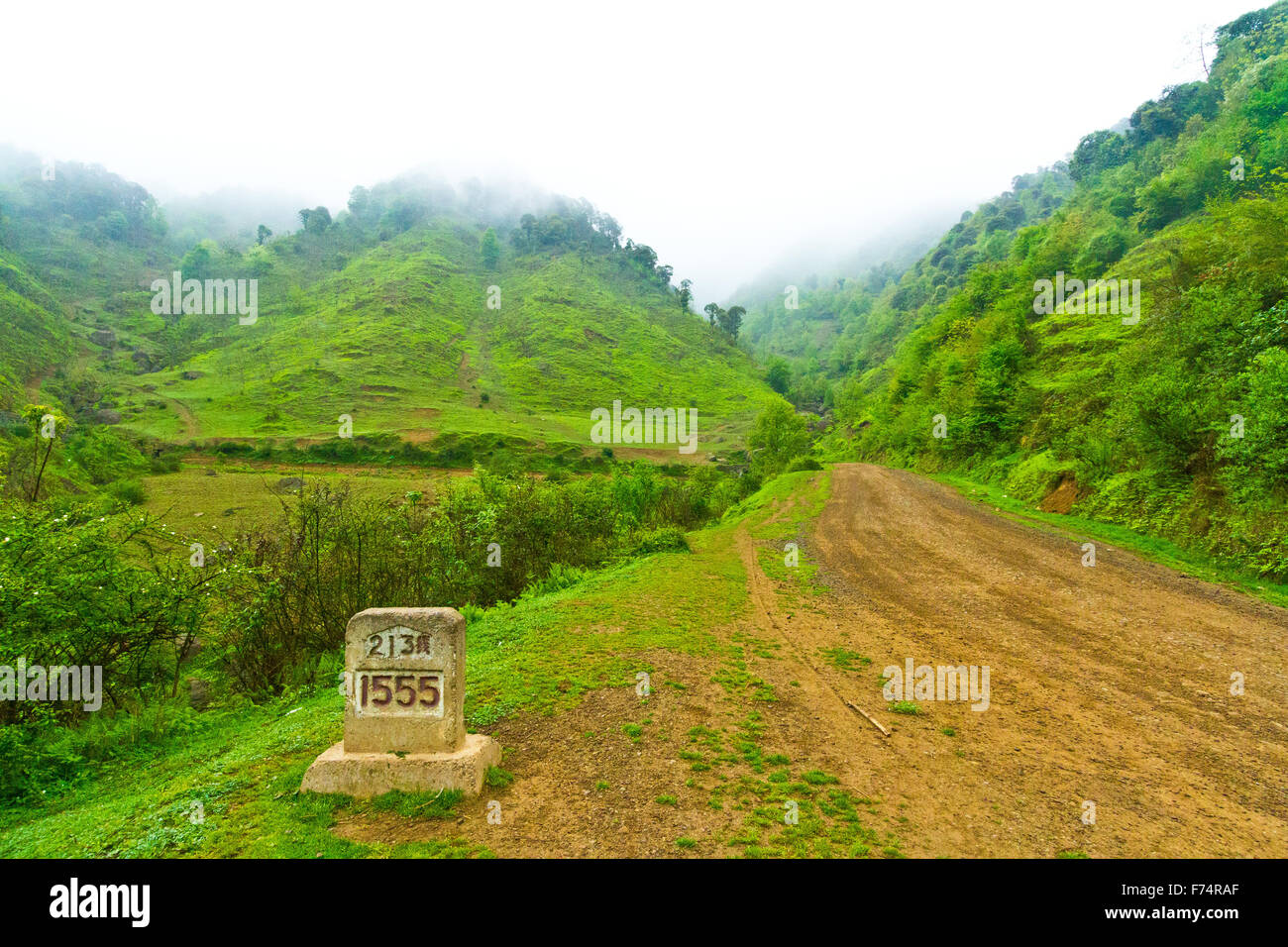 Going into the clouds in remote Chinese mountains. - Stock Image
