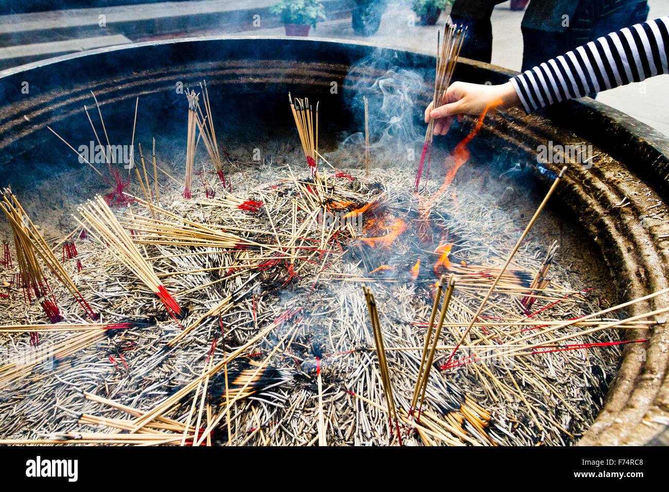 Incense bowl at the entrance of Wenshu temple in Chengdu. - Stock Image