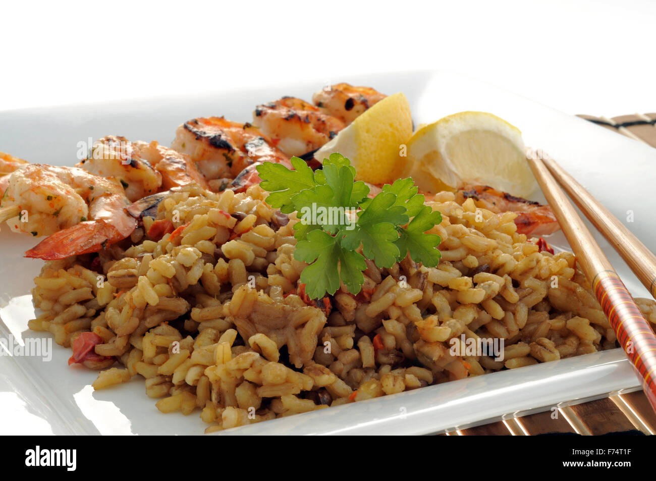 Grilled shrimp and rice Stock Photo - Alamy