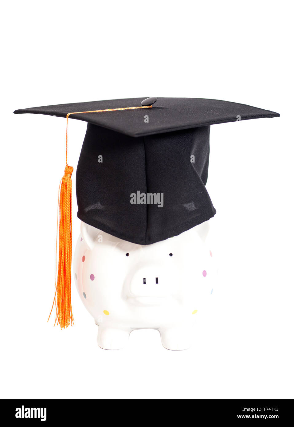 Piggy bank with black graduation hat isolated on white background Stock ...