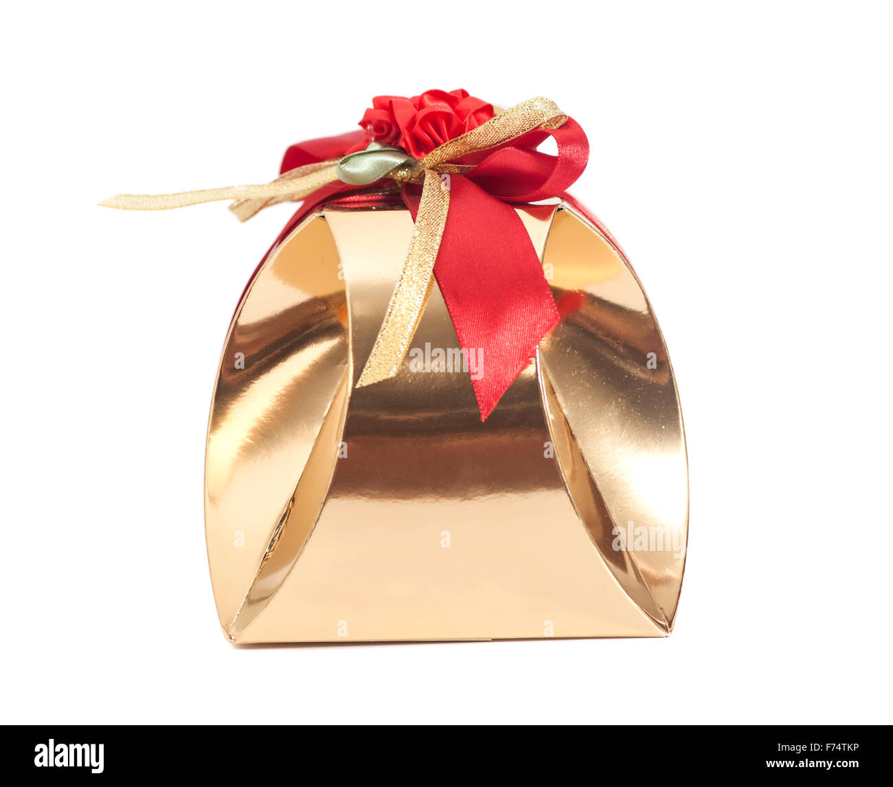 Golden gift box with ribbon over white background Stock Photo - Alamy
