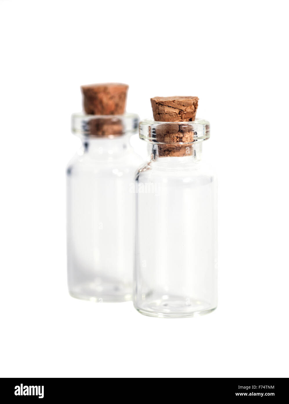 Glass bottles with cork cover isolated on white Stock Photo Alamy