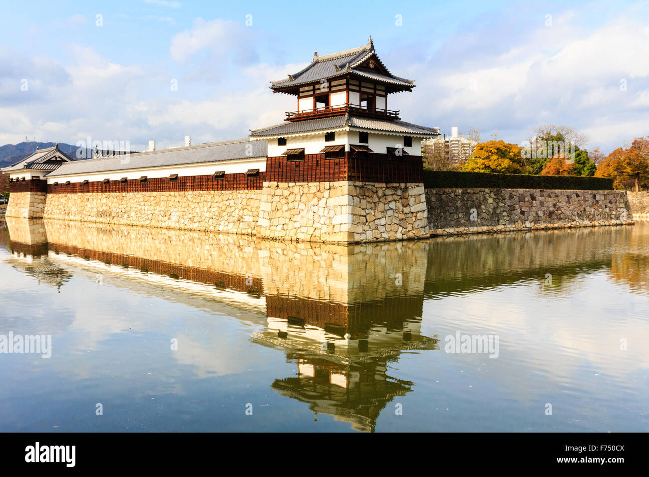Japan Hiroshima Castle Daytime View Of The Outer Reconstructed Wall With The Taiko Corner Yagura Turret And Its Reflection In The Moat Stock Photo Alamy