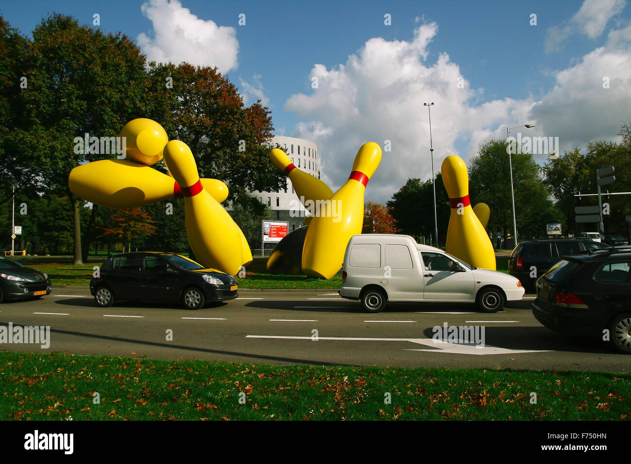 EINDHOVEN, NETHERLANDS - OCTOBER 17, 2009: Bowling strike sculpture in a public park next to the road,  in the city of Eindhoven Stock Photo