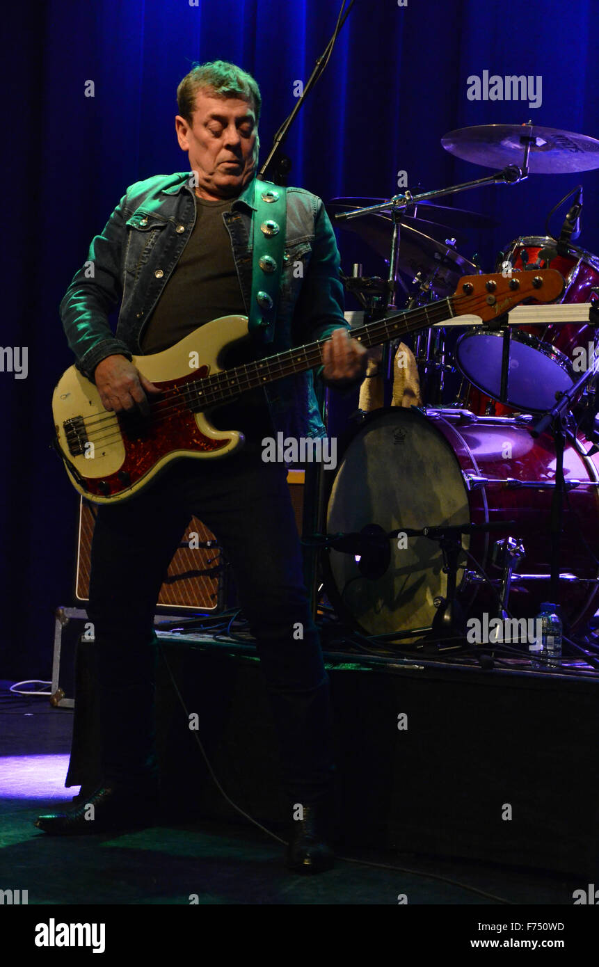 Gerry McAvoy of Band of Friends on stage playing his Fender Precision bass guitar Stock Photo