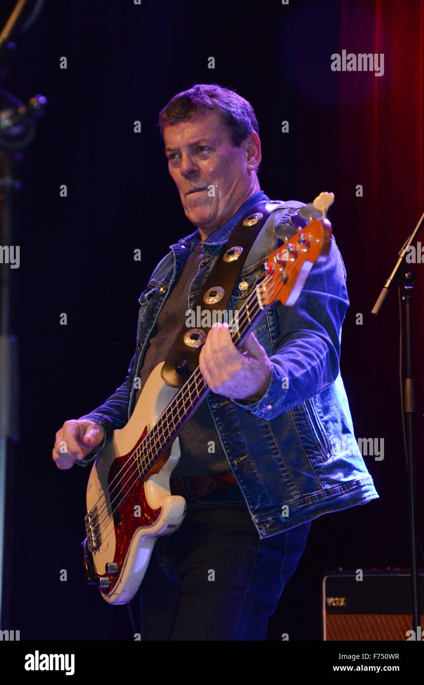 Gerry McAvoy of Band of Friends on stage playing his Fender Precision bass guitar Stock Photo