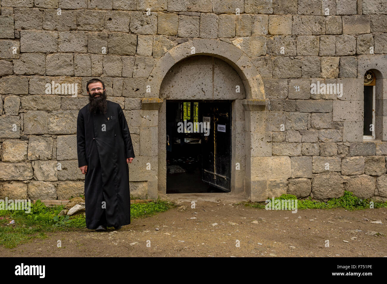 Priest in Tatev monastery Stock Photo Alamy