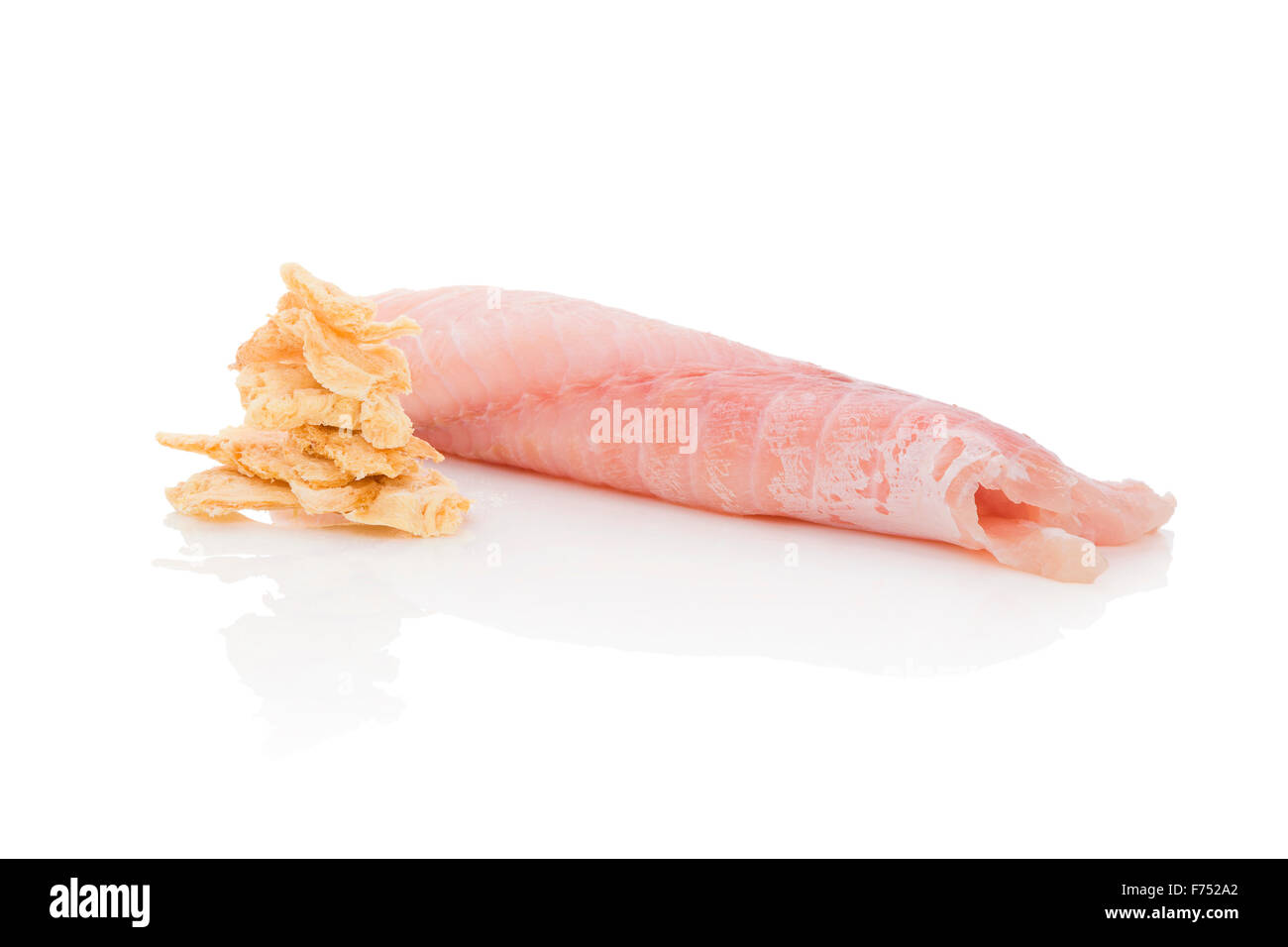 Fresh catfish fillet and dry fish chips isolated on white background. Culinary healthy seafood