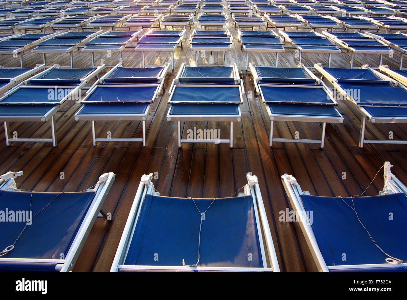 Many hammocks on a teak deck Stock Photo Alamy