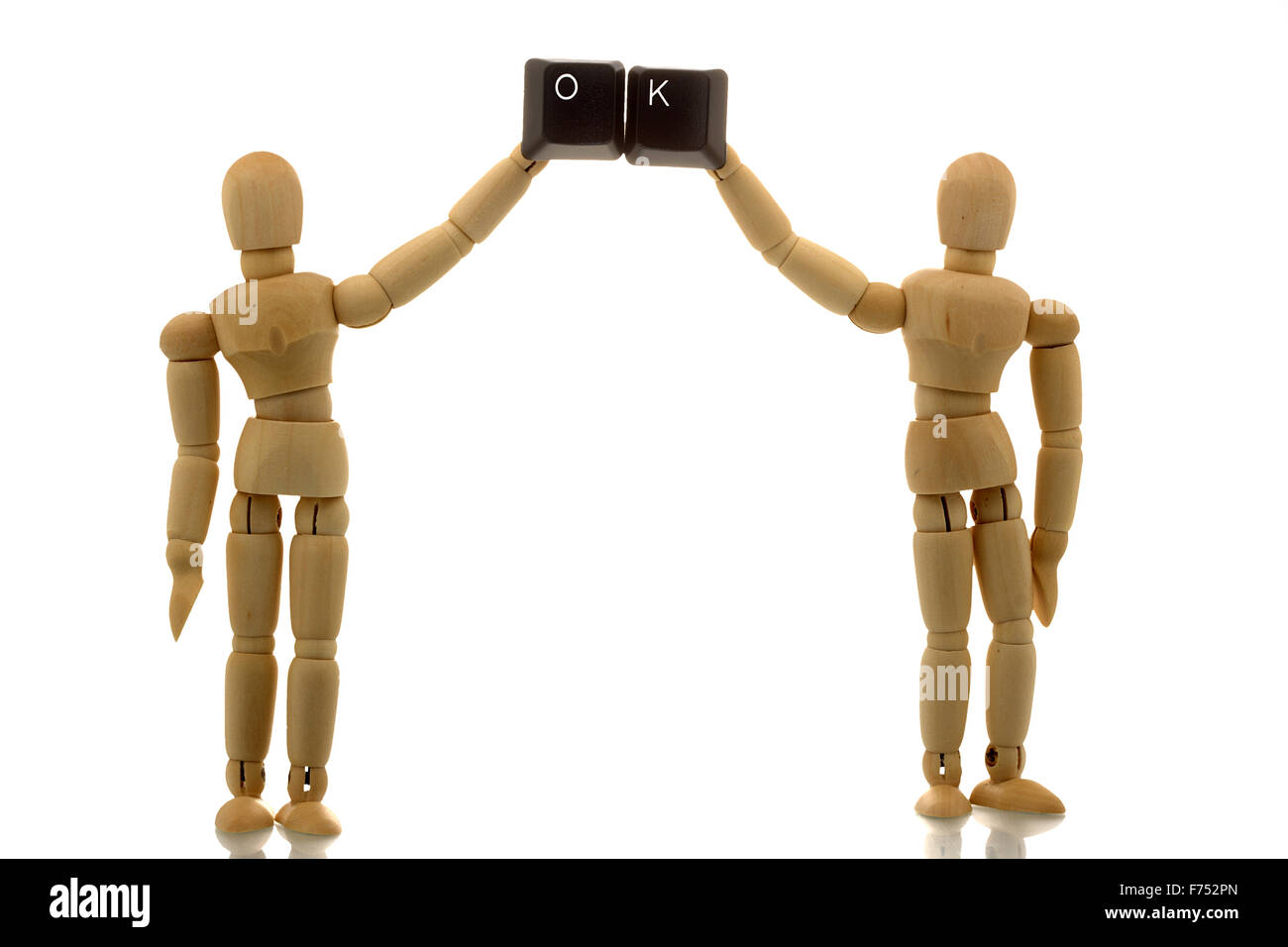 Manikins showing OK together Stock Photo Alamy