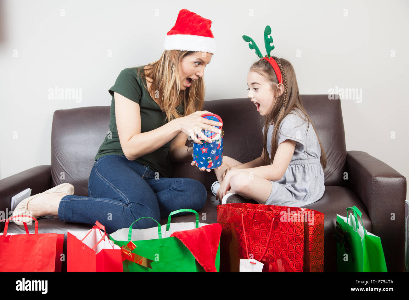 Mother and daughter celebrating christmas Stock Photo