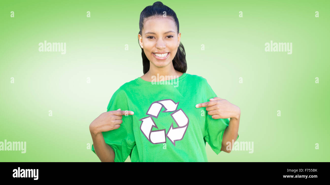 Composite image of happy environmental activist in the park Stock Photo