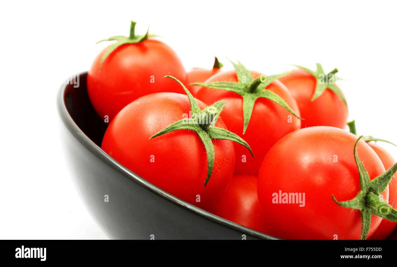 tomatoes in a bowl Stock Photo - Alamy