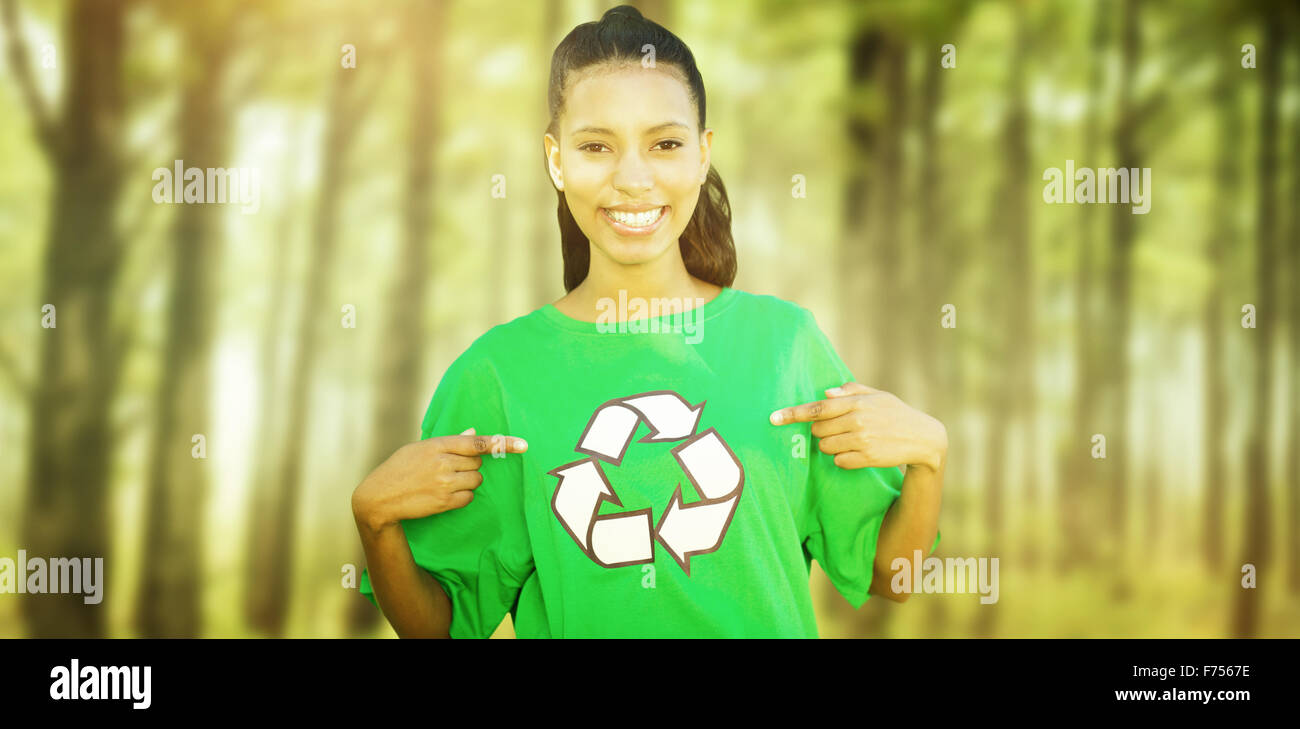 Composite image of happy environmental activist in the park Stock Photo