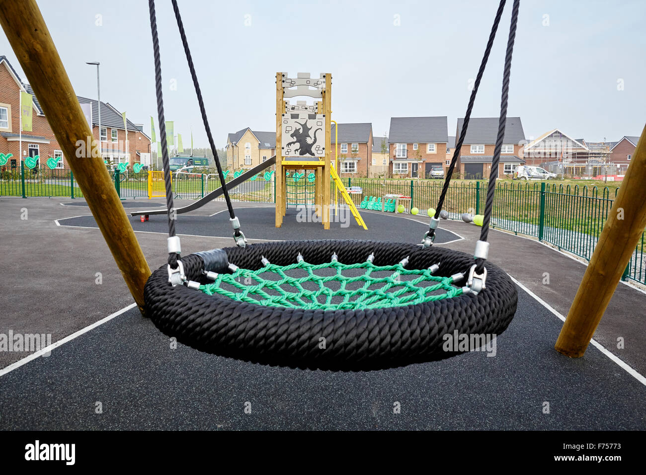 Riverside View on New Quay Road, Lancaster, in Lancashire. Same children's playground on a modern new estate   Young kids childr Stock Photo