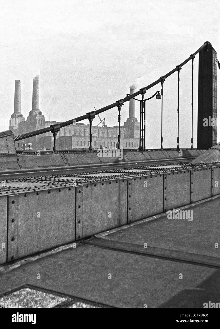 An archival image from 1952 of Battersea Power Station and taken from Chelsea Bridge in London. Stock Photo