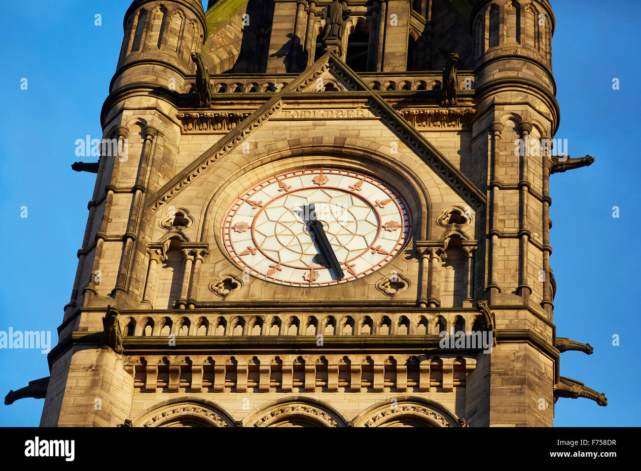 Manchester Town Hall clock tower clock face detail  Manchester Town Hall is a Victorian, Neo-gothic municipal building in Manche Stock Photo