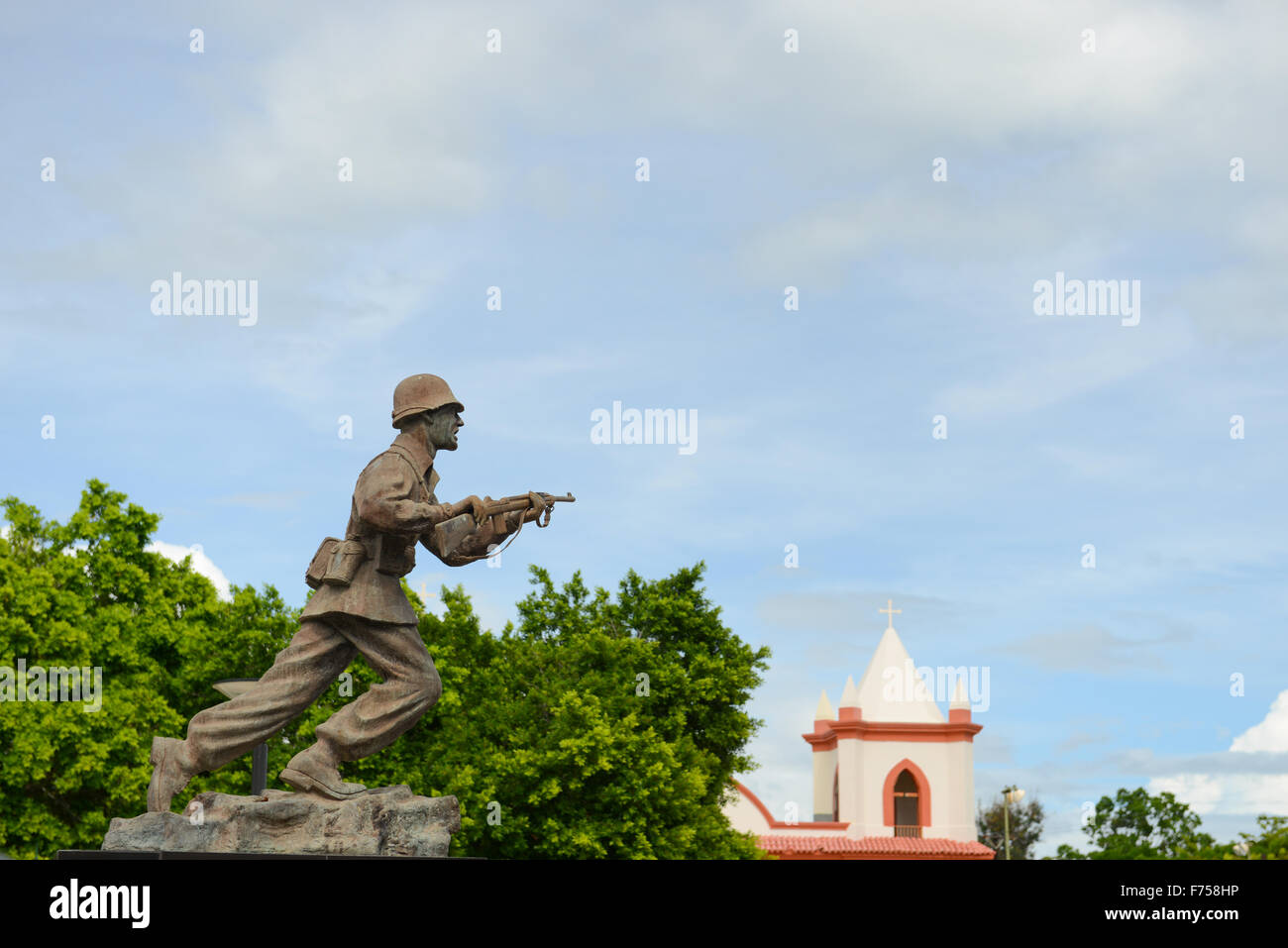 Sculpture of a soldier at a war memorial in the town of Guayanilla, Puerto Rico. USA territory. Caribbean Island. Stock Photo