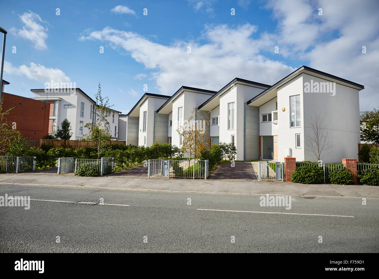 Modern houses in Manchester Uk development House home place living environment building street Suburban suburbia  suburbs town v Stock Photo