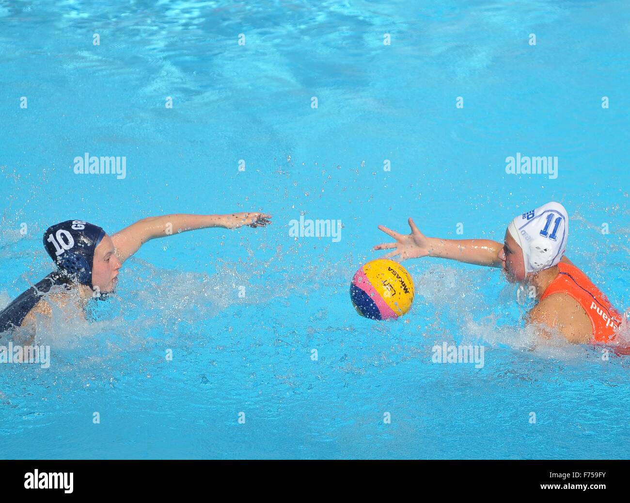 Katherine Rogers (GBR) and Anouk Bergsma (NED) race for the ball. Holland (NED) v Great Britain (GBR). Womens Water Polo. Water Polo Area. Baku. Azerbaijan. Baku2015. 1st European Games. 14/06/2015. Stock Photo