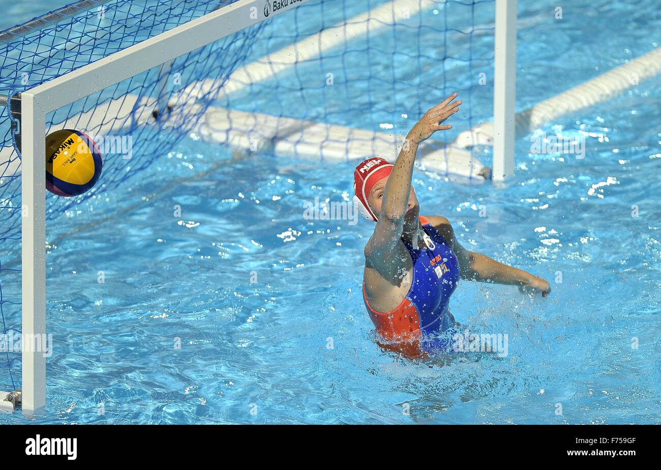 TeamGB score past Michelle Boone (NED, goalkeeper). Holland (NED) v Great Britain (GBR). Womens Water Polo. Water Polo Area. Baku. Azerbaijan. Baku2015. 1st European Games. 14/06/2015. Stock Photo