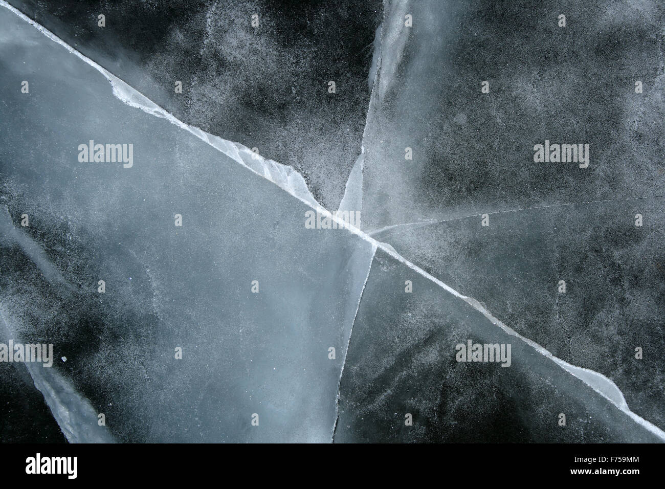 Cracked ice abstract background Stock Photo - Alamy