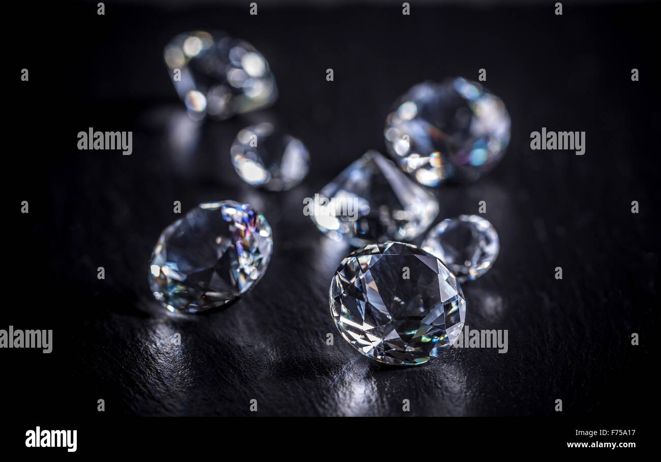 Brilliant diamond on black background Stock Photo - Alamy