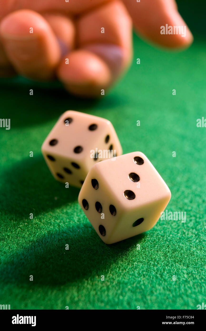 Hand Throwing And Rolling Dice Gambler Tossing Five Red Poker And Casino  Dice On Table Man Gambling Or Playing Board Game Stock Photo - Download  Image Now - iStock