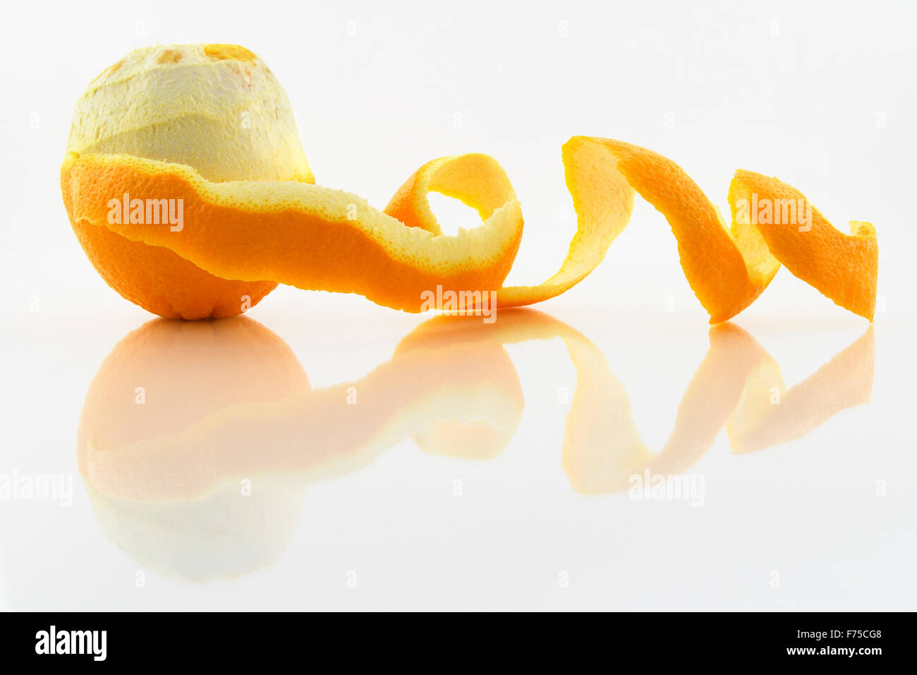 Orange With Peeled Skin Stock Photo Alamy