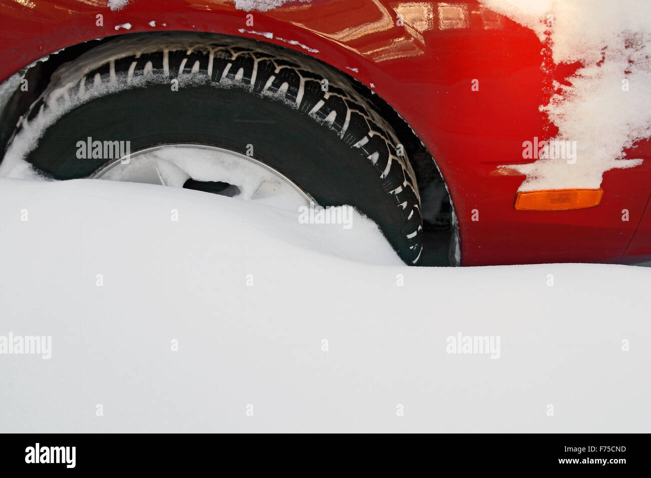 Car wheel stuck in the deep snow Stock Photo Alamy