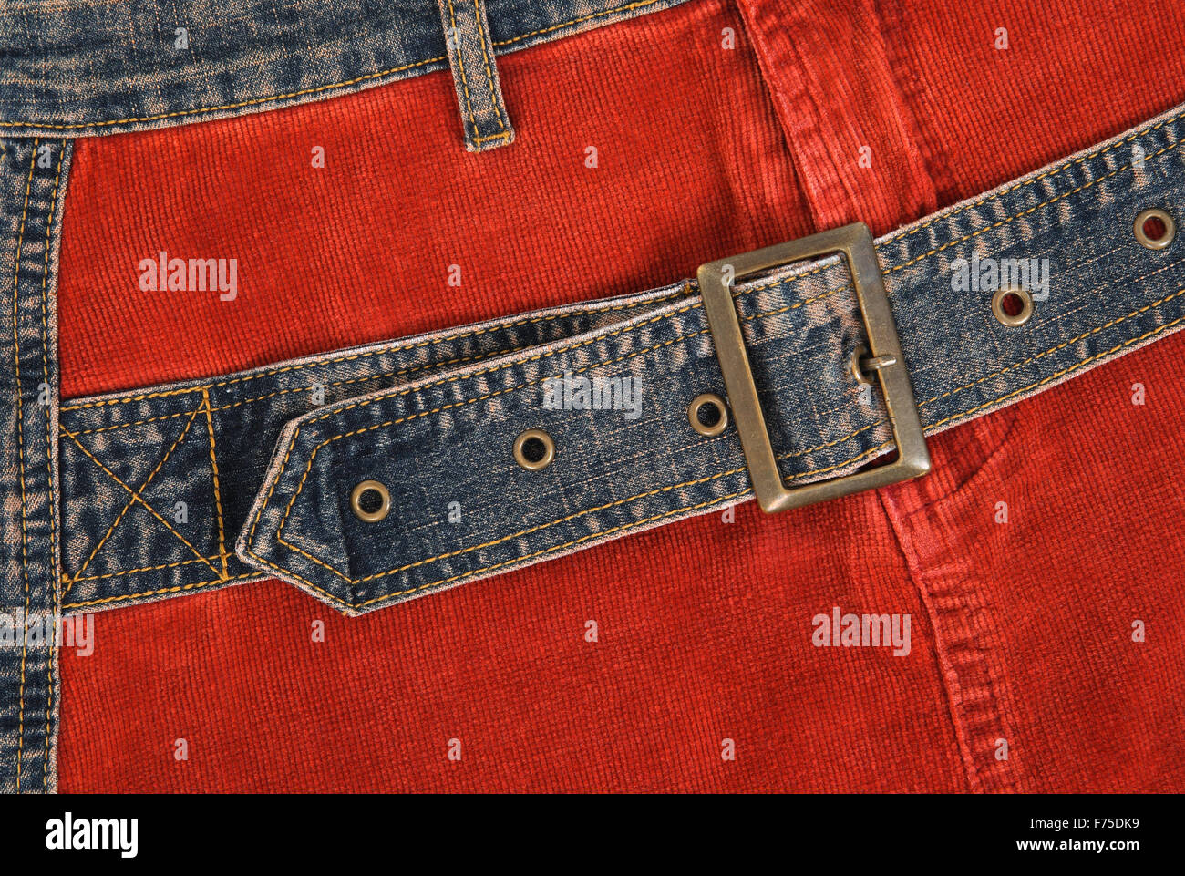 Corduroy clothing with denim belt Stock Photo - Alamy