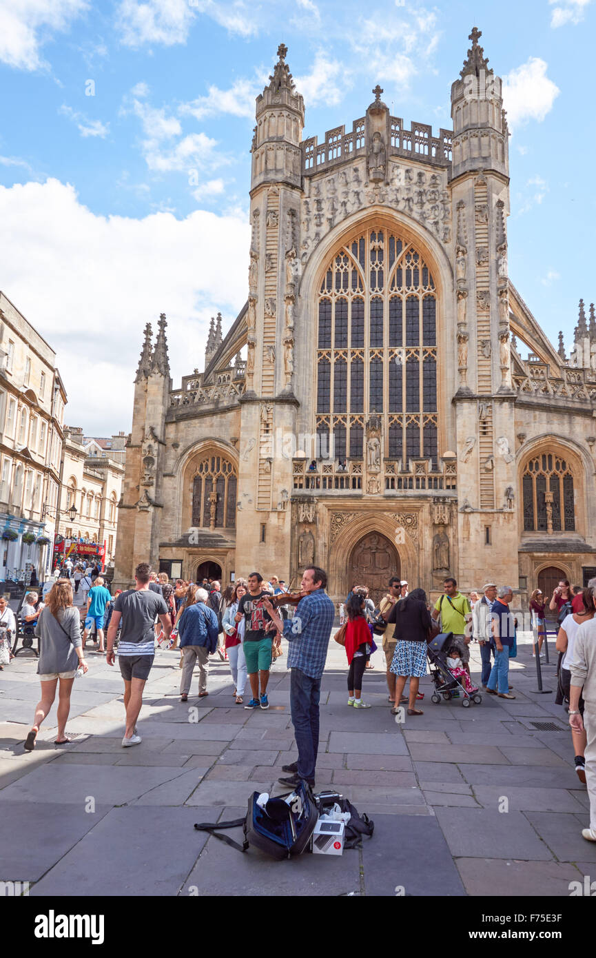 Busker in front of Bath Abbey in Bath, Somerset England United Kingdom UK Stock Photo