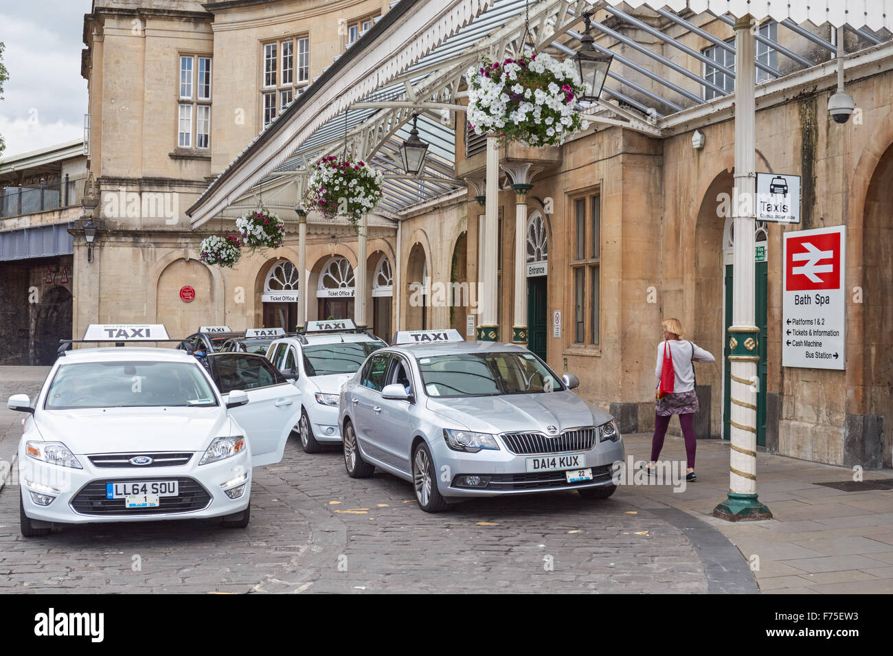 A taxi rank outside Bath Spa Railway Station, Bath Somerset England