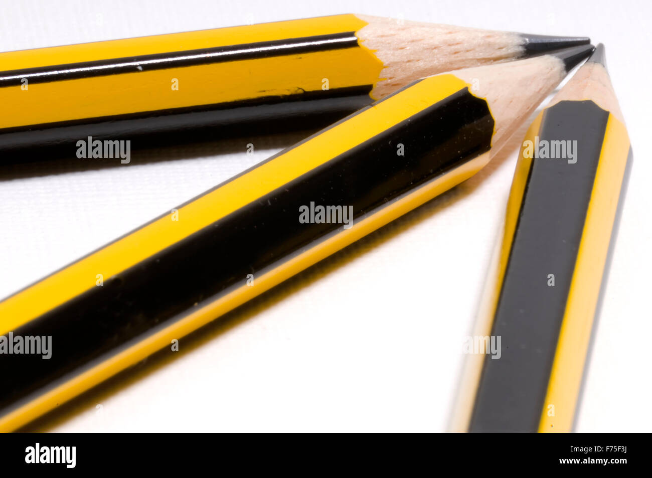Pencils on white paper Stock Photo