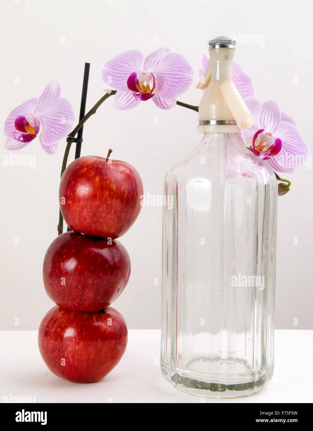 Orchids and soda Stock Photo