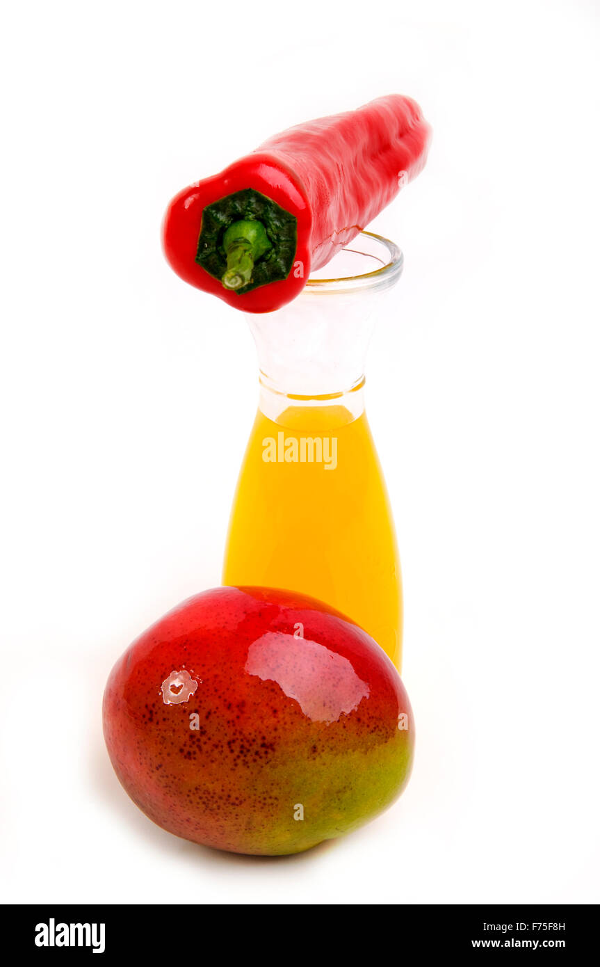Mango, chili and orange juice Stock Photo Alamy