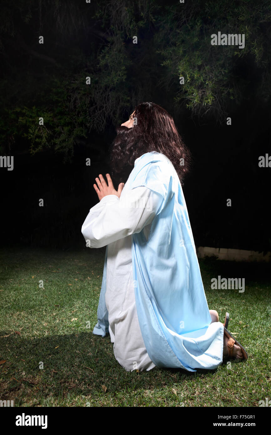 Jesus kneeling in prayer hi-res stock photography and images - Alamy