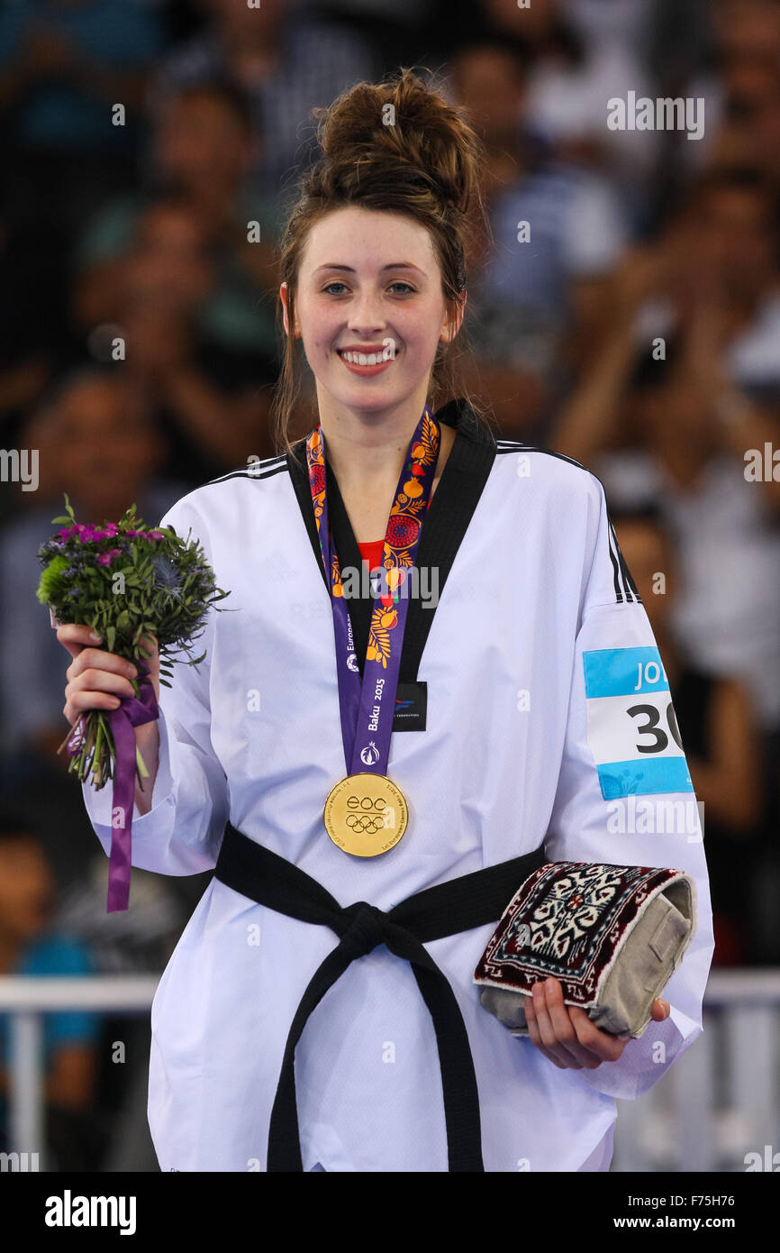 Jade Jones (GBR) celebrates after being presented with her gold medal