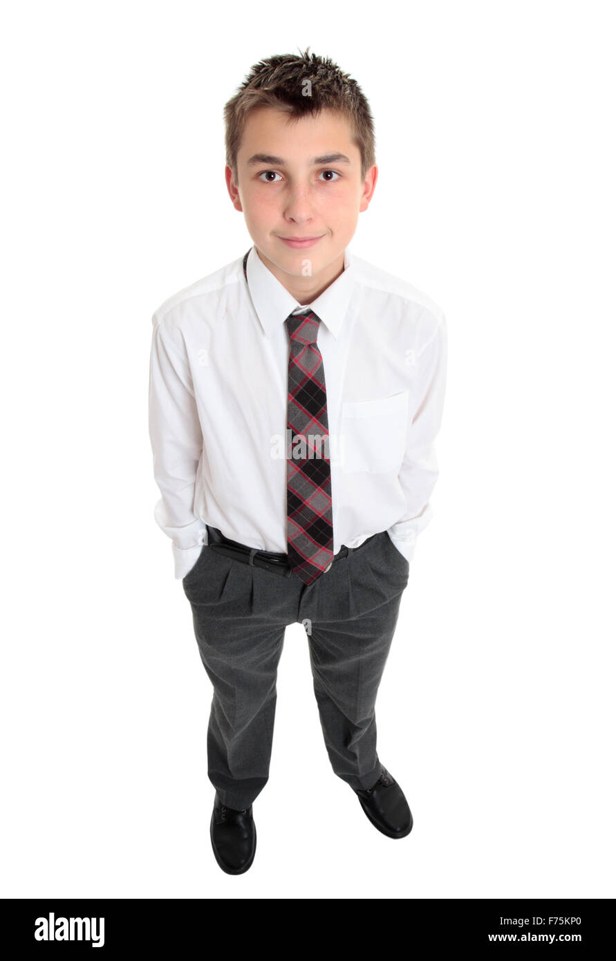 Typical school boy stands in uniform Stock Photo