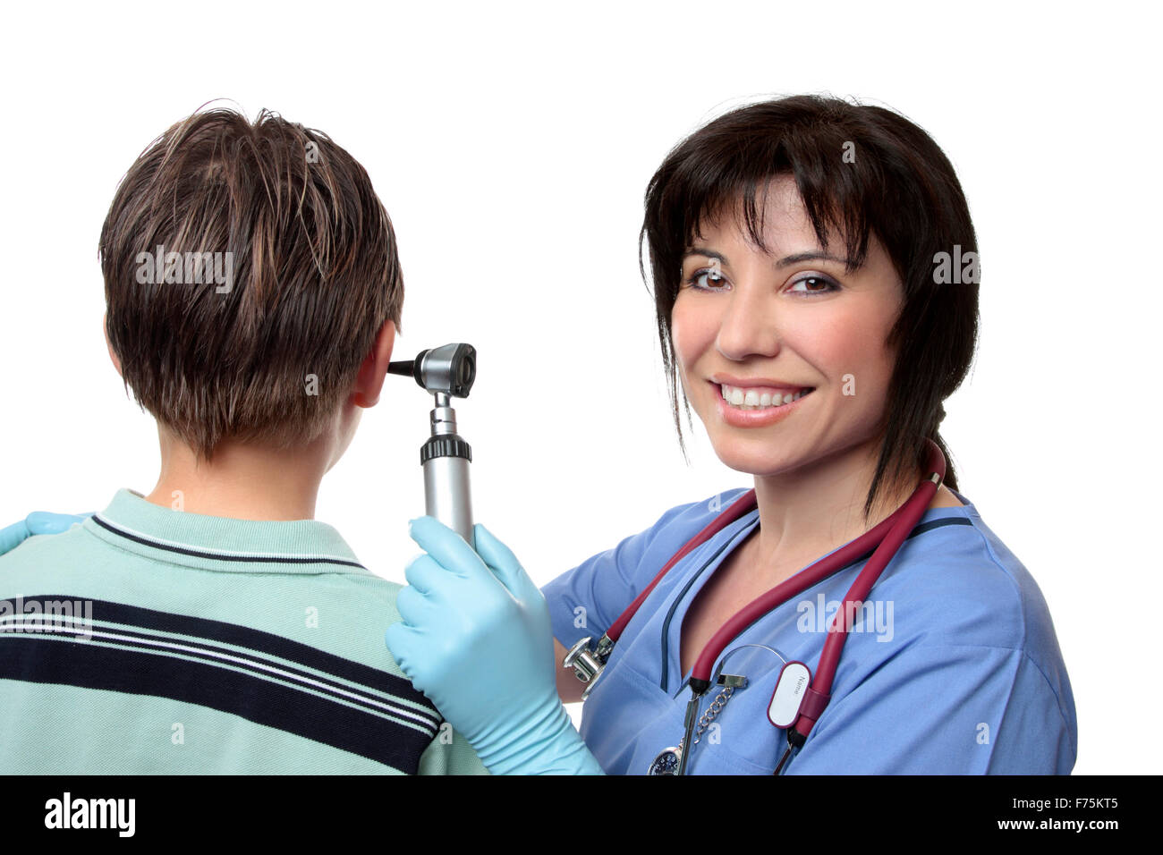 Doctor checking ears with otoscope Stock Photo Alamy