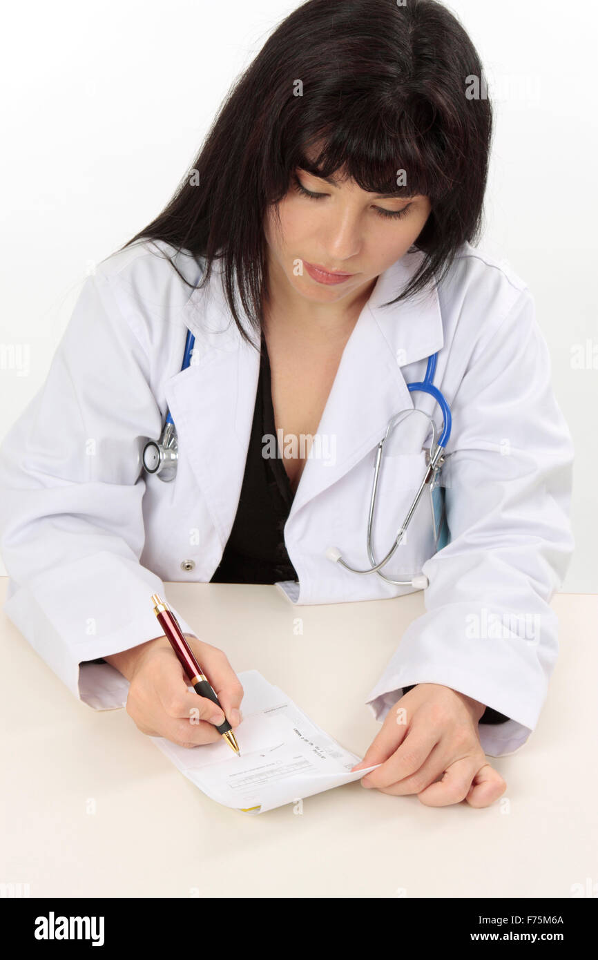 Female doctor writing a script for medicine Stock Photo Alamy