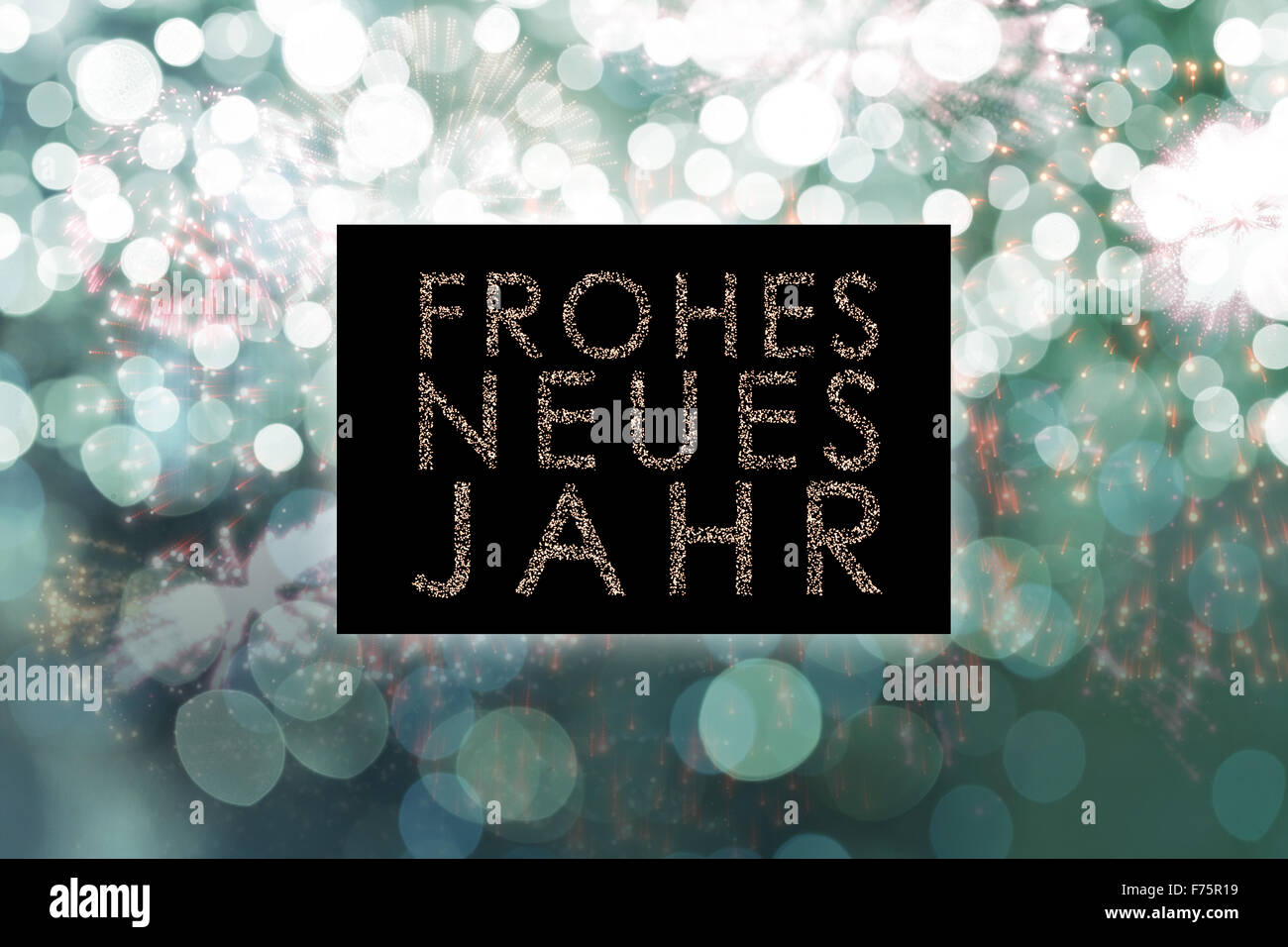 Composite image of glittering frohes neues jahr Stock Photo