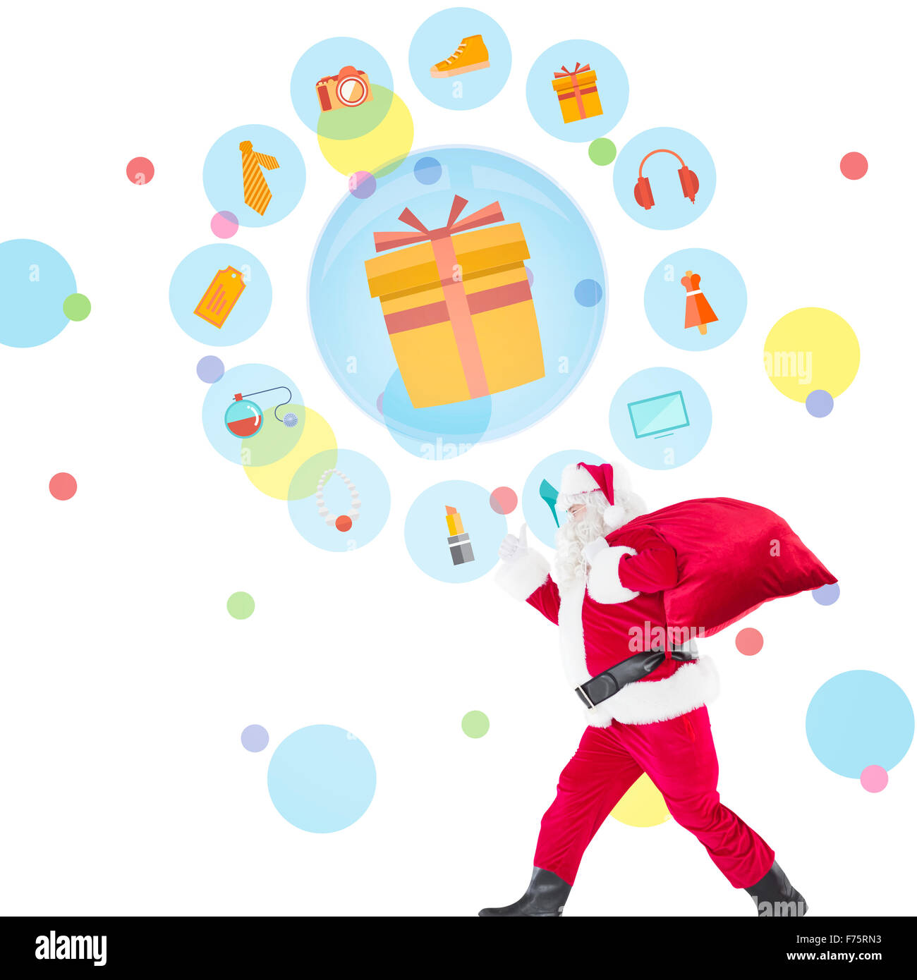 Composite image of positive santa with a sack and thumbs up Stock Photo ...