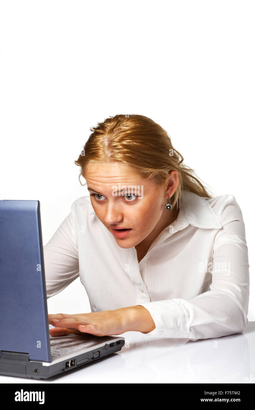 Portrait of a surprised business woman working on a laptop Stock Photo ...