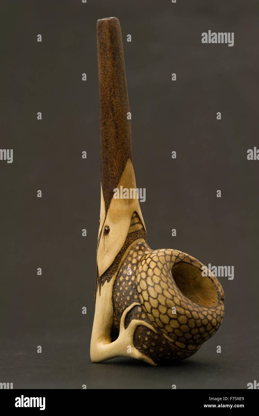Tobacco pipe with wood engraving Stock Photo Alamy