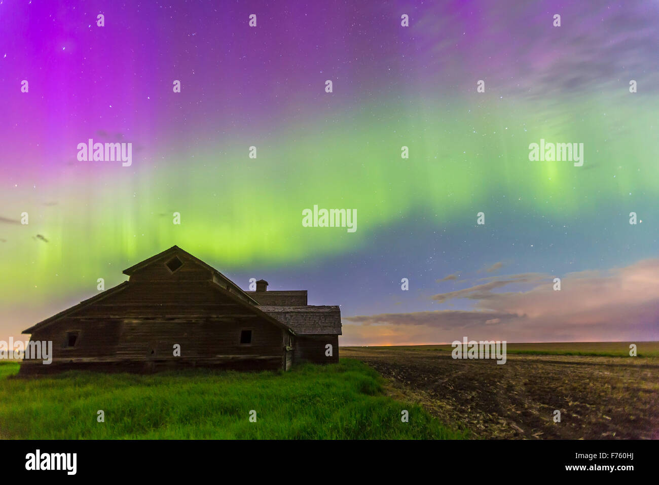An all-sky aurora with green and purple curtains, the night of June 7-8, 2014, starting up about 12:30 and going until dawn. Thi Stock Photo