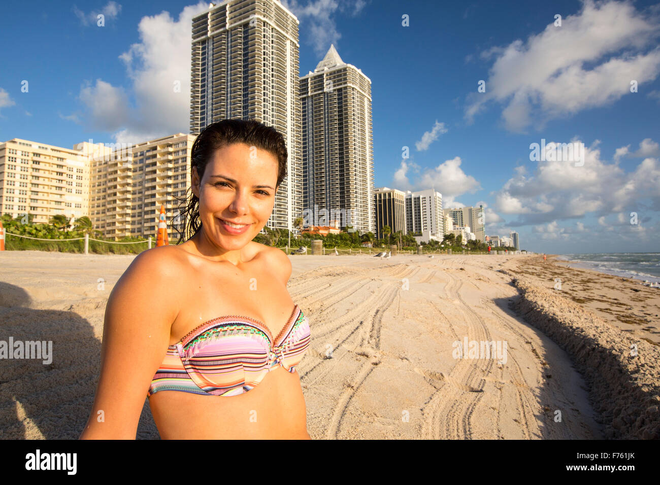 A woman in a bikini on Miami Beach, Florida, USA. Stock Photo