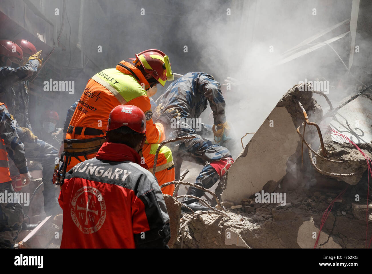 Rescue personnel searching dead bodies, earthquake, nepal, asia Stock Photo