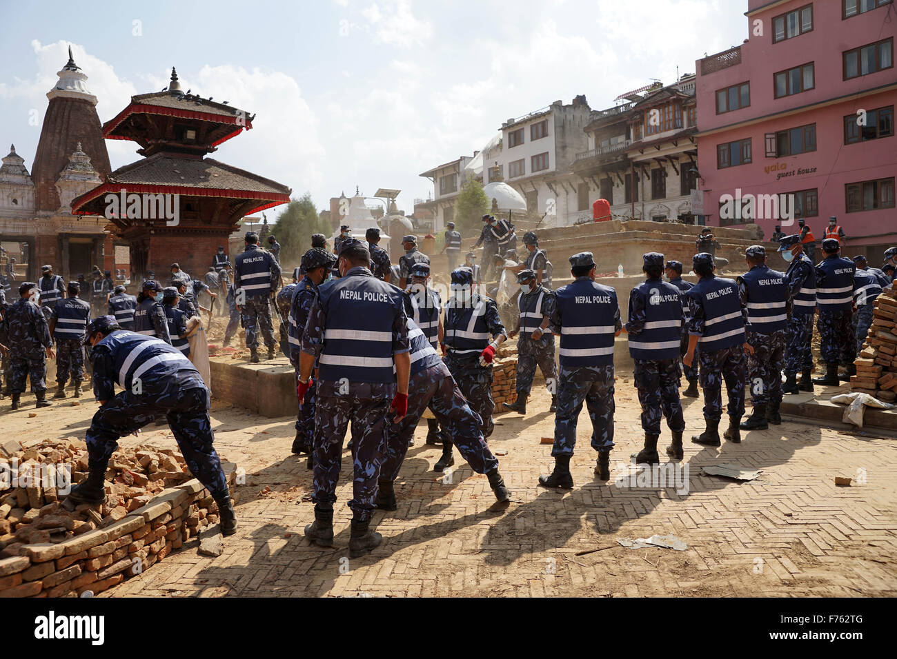 Police personnel clearing debris, krishna temple, nepal, asia Stock Photo